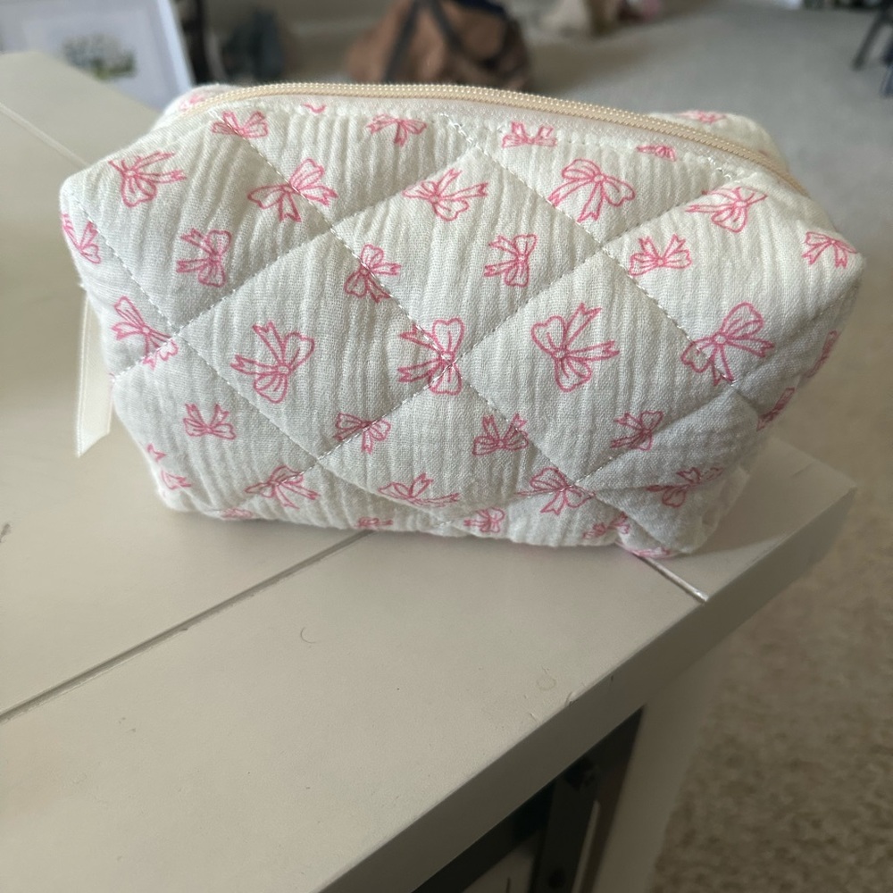 Small Toiletry/make up bag 
NEVER USED
